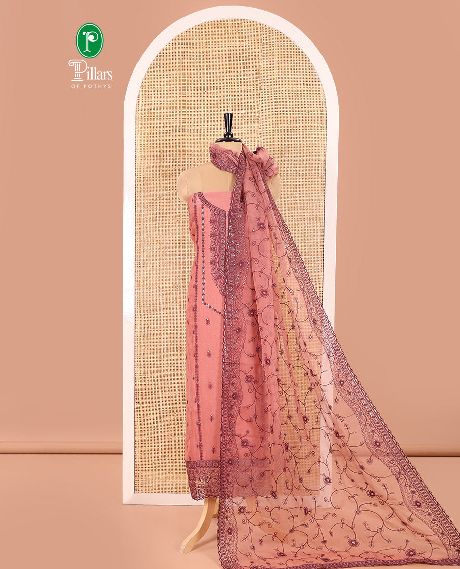 Dusky Magenta Material Chudidar Set Adorned with Embroidered Organza Chiffon Top, Subtly Made Plain Santoon Bottom, and a Organza  Dupatta Featuring Floral Jaal Embroidery