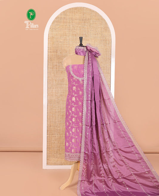 Dark Lavender Chudidar Set Artfully Detailed with Floral Jaal Jacquard Design and Embroidered Viscose Chinon Unstitched Top, Readymade Free Size Chinon Sharara Pants, and a Chinon Embroidered Scallop-Bordered Dupatta