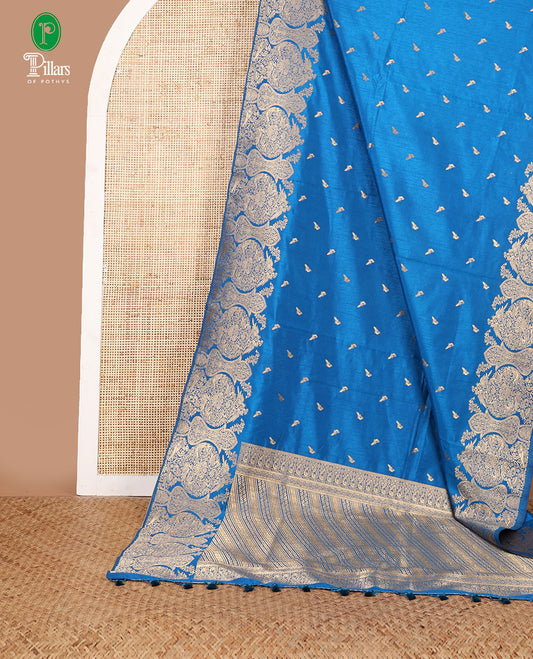 Peacock blue zari peacock butta dola raw silk saree with kancheepuram zari border with geometrical zari pallu along with plain blouse