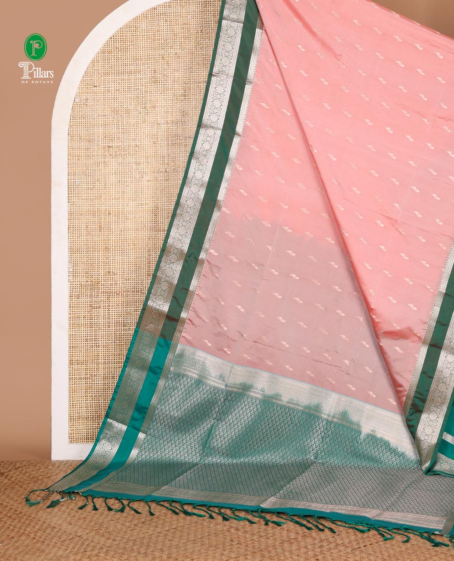 Baby pink zari butta semi soft silk saree with rettai pettu, diamond border grand pallu along with plain blouse