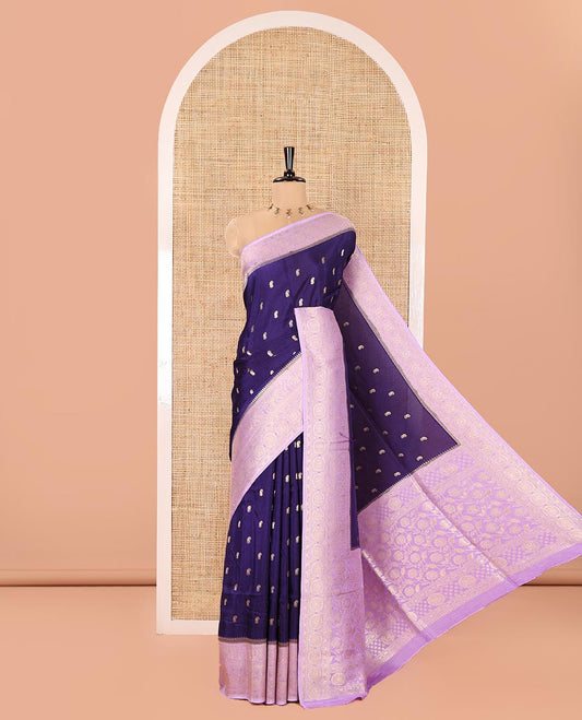 Navy Blue Russian Dola Silk Saree, Elevated with Paisley Buttas All Over Its Body, Complemented by a Contrast Traditional Zari Design Border, Pallu of Floral Jaal Designs, and Paired with a Contrast Blouse