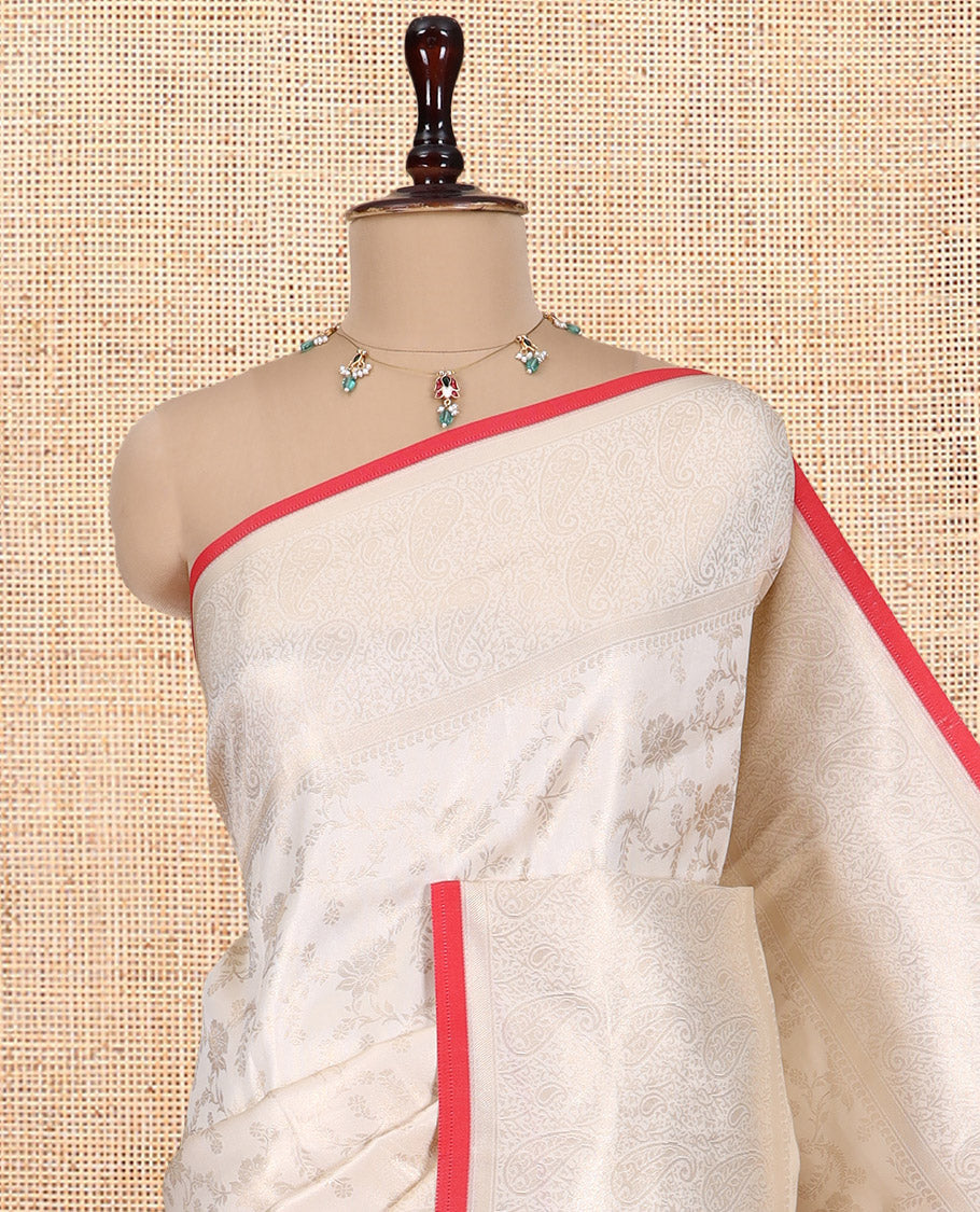 Off-White-Red Semi-Silk Saree, Adorned with Floral Jacquard Design, a Zari Paisley Border, and a Contrast Blouse