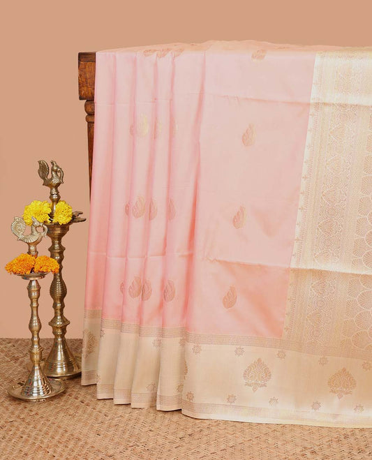 Peach semi soft silk saree with peacock border & rich pallu along with plain blouse
