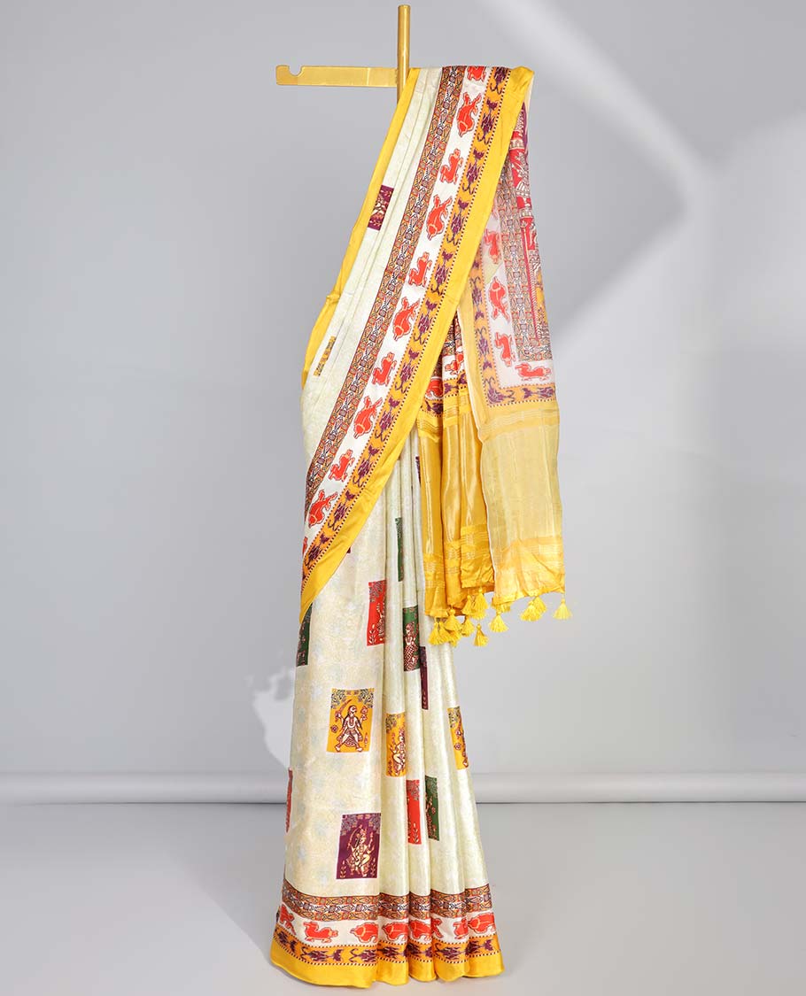 Cream human motifs semi-banaras printed saree with contrast border & wedding design pallu