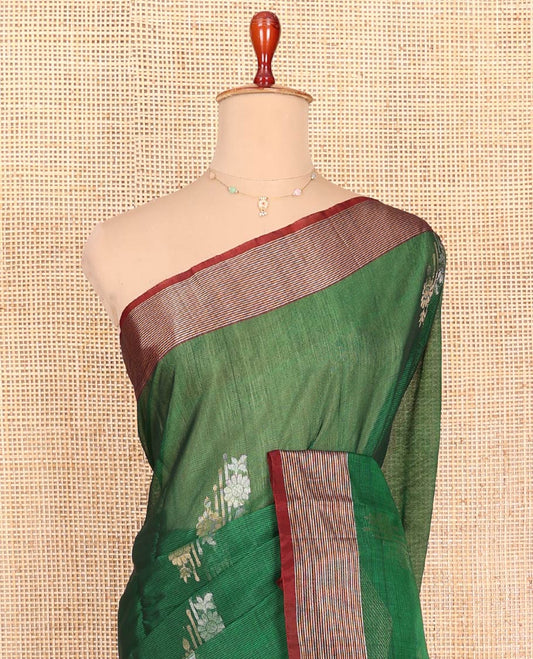 Green Silk Cotton Saree, Adorned with Floral Buttas All Over Its Body, Complemented by a Contrast Zari Striped Border, Pallu of Jaal Designs, and Paired with a Contrast Blouse