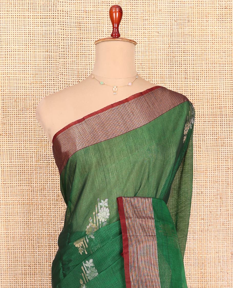 Green Silk Cotton Saree, Adorned with Floral Buttas All Over Its Body, Complemented by a Contrast Zari Striped Border, Pallu of Jaal Designs, and Paired with a Contrast Blouse