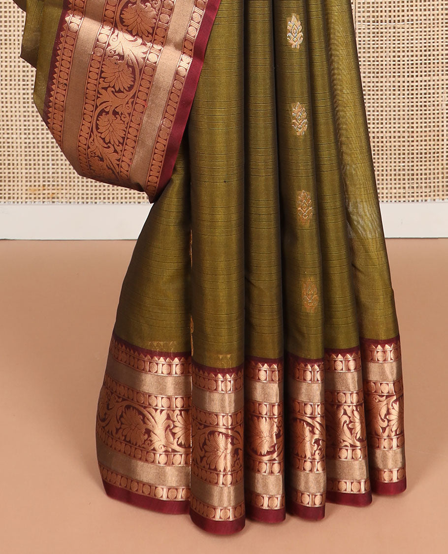 Green floral motifs silk cotton saree with contrast intricate zari design border & paisley design pallu