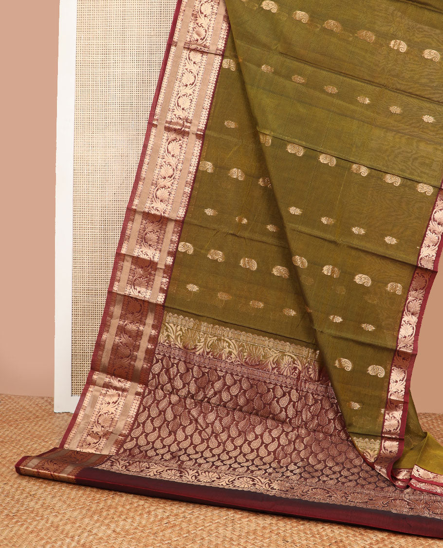 Green floral motifs silk cotton saree with contrast intricate zari design border & paisley design pallu