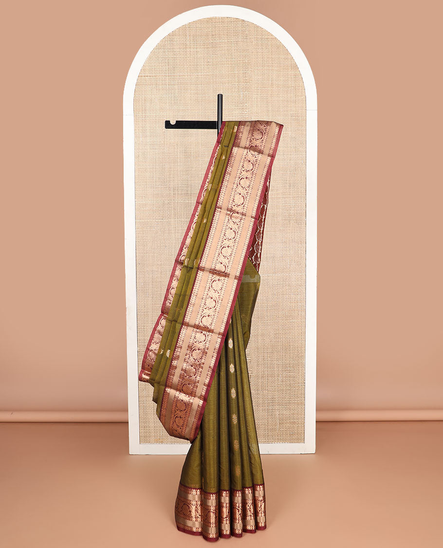 Green floral motifs silk cotton saree with contrast intricate zari design border & paisley design pallu