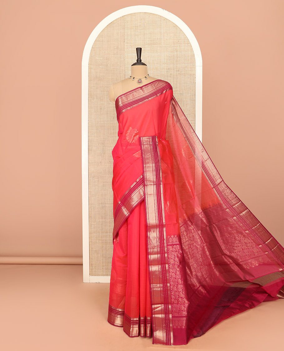 Red Silk Cotton Saree Accentuated with Zari Buttas All Over the Body, Complemented by a Contrast Border of Traditional Zari Designs, Featuring a Pallu of Floral and Geometric Zari Designs, and Paired with a Contrast Blouse