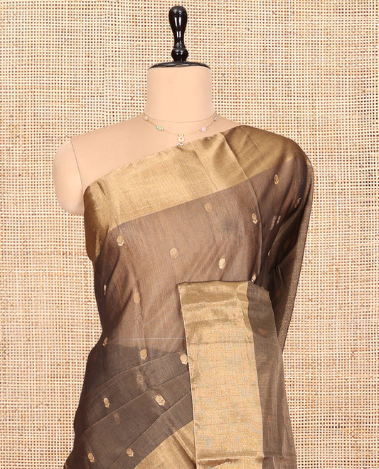 Brown Silk Cotton Saree, Adorned with Buttas, Gleaming Bavanji Border, Pallu Steeped with Stripes, and a Matching Blouse