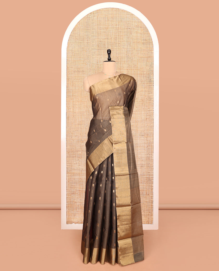 Brown Silk Cotton Saree, Adorned with Buttas, Gleaming Bavanji Border, Pallu Steeped with Stripes, and a Matching Blouse