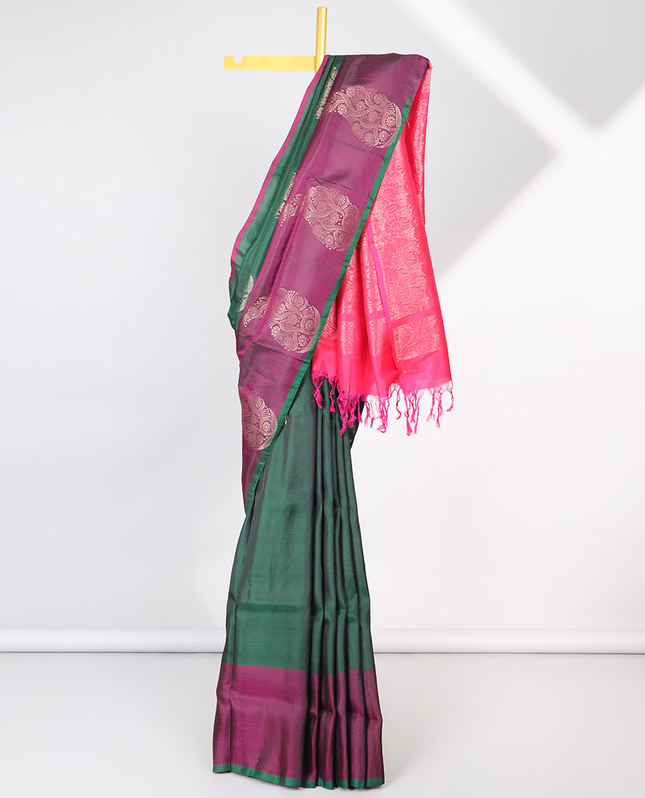 Green paisley motifs semi-soft silk saree with contrast border & pallu of intricate zari design pallu