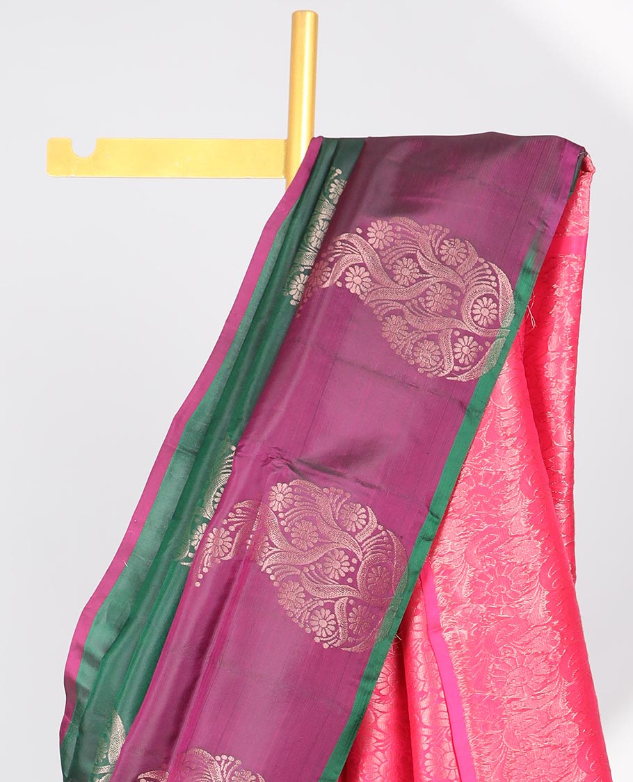Green paisley motifs semi-soft silk saree with contrast border & pallu of intricate zari design pallu