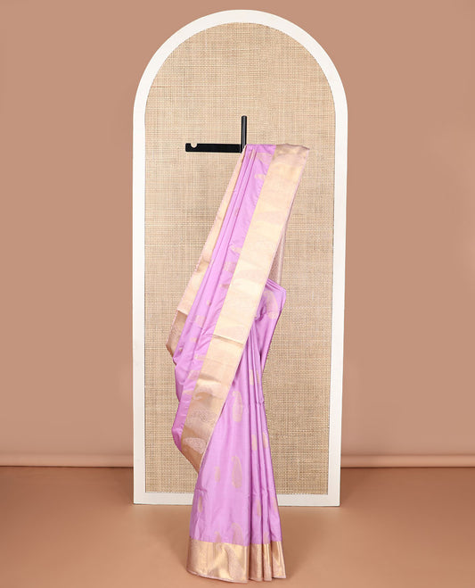 Light pink paisley design soft silk saree with contrast paisley design border & floral enclosed checked design pallu