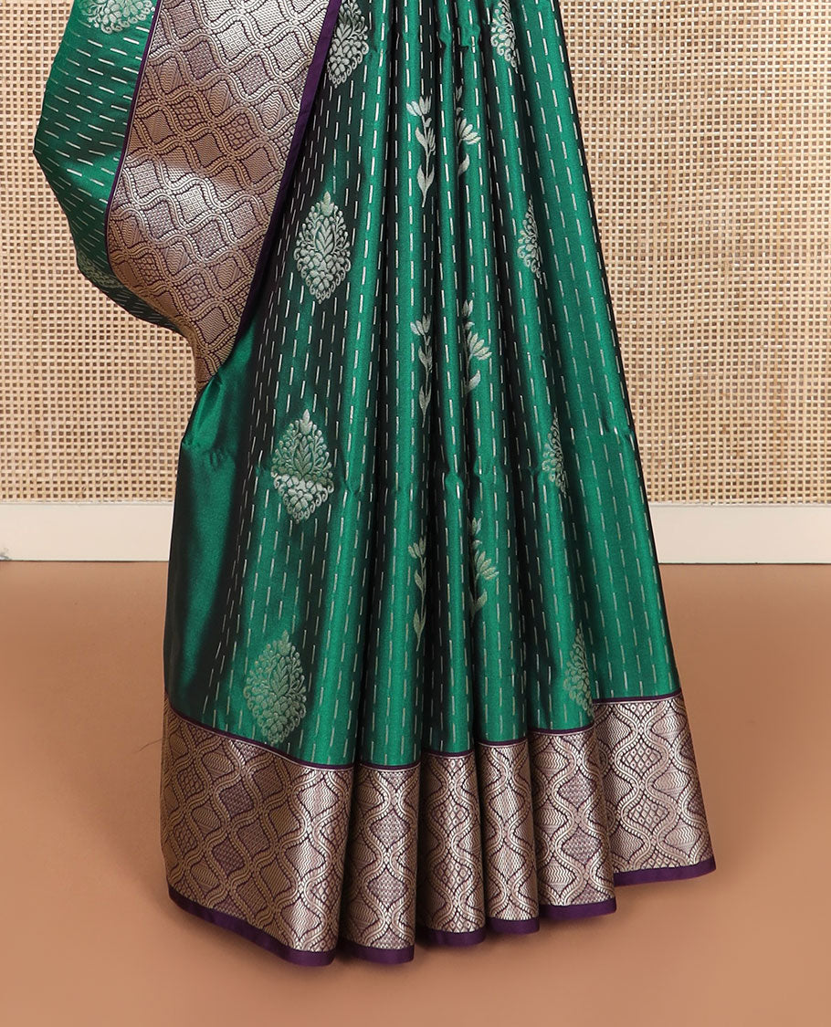 Green zari designs soft silk saree, contrast jaal zari border, and pallu of traditional zari designs