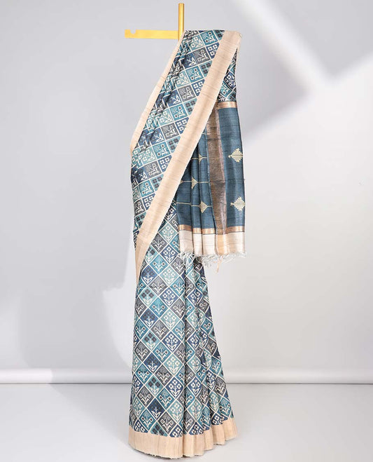 Blue floral enclosed with argyle design tussar silk saree with contrast border & striped design pallu