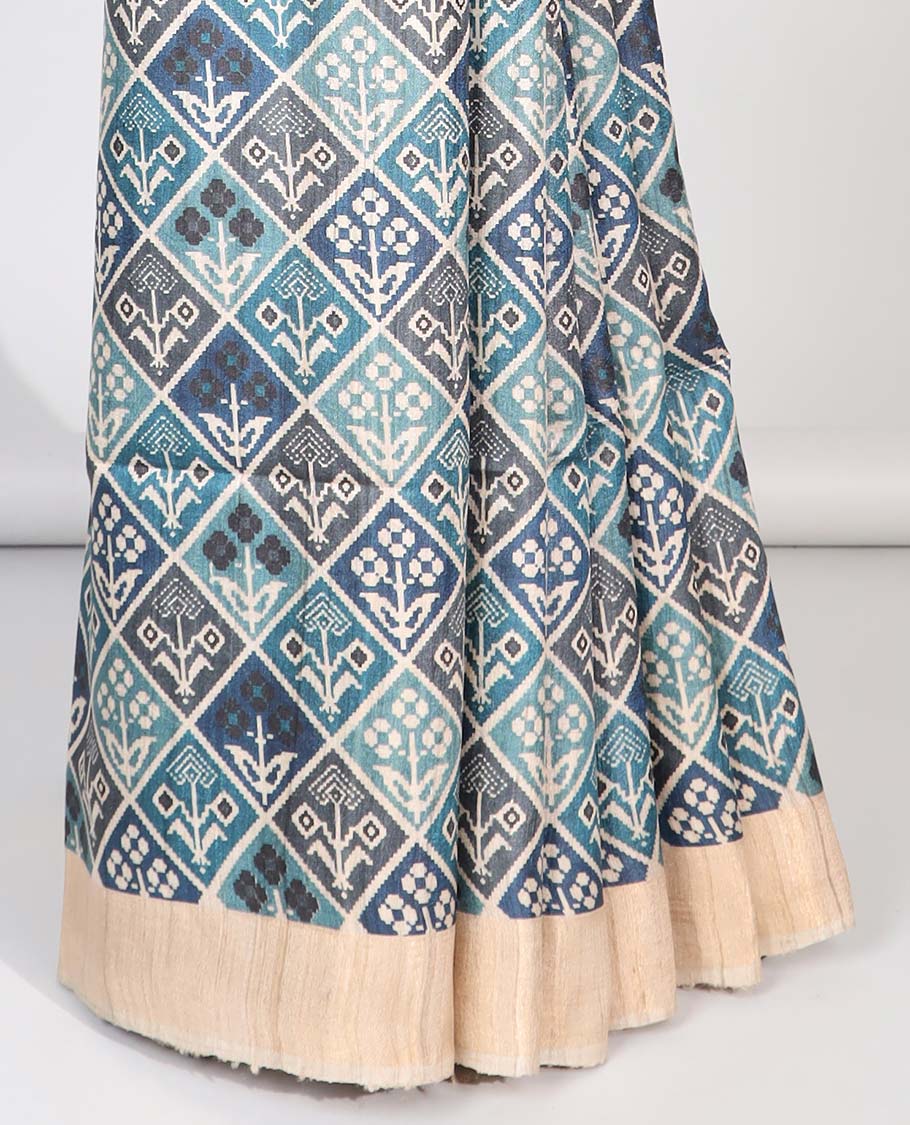 Blue floral enclosed with argyle design tussar silk saree with contrast border & striped design pallu