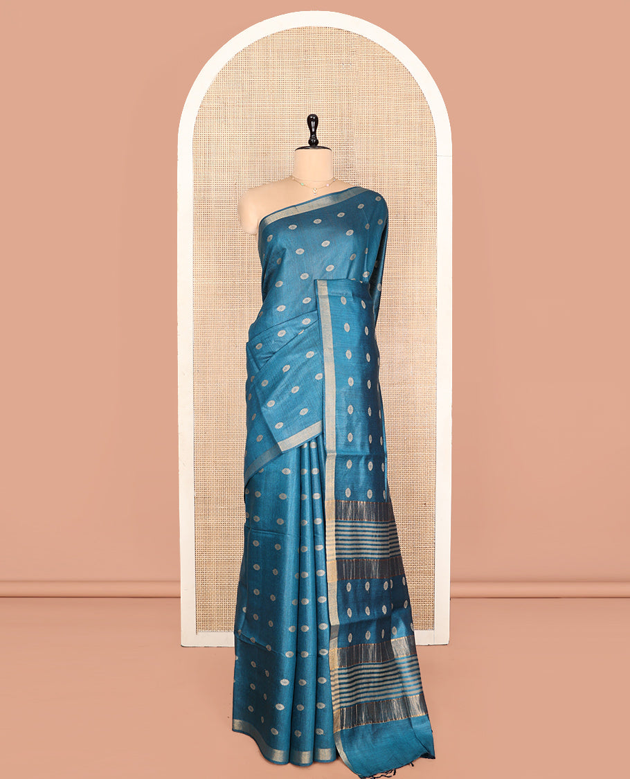 Blue Tussar Silk Saree, Steeped with Floral Buttas, a Subtle Border, Pallu Features Stripes and Buttas, and a Matching Blouse