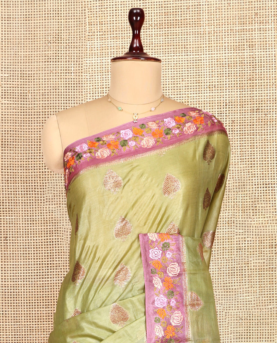 Green Tusser Silk Saree, Adorned with Buttas, a Contrast Floral Embroidered Border, Grand Pallu, and a Contrast Blouse