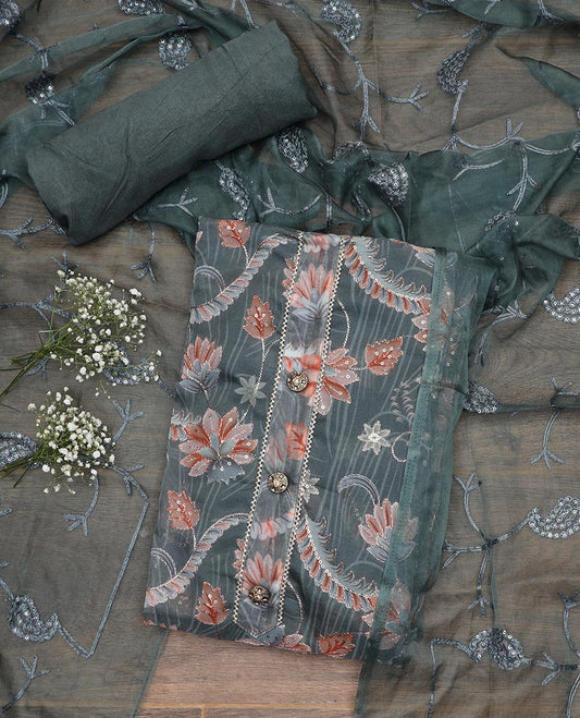 Green material chudidar set, floral printed with thread outline, embroidered top, plain bottom, and floral jaal sequins embroidered dupatta