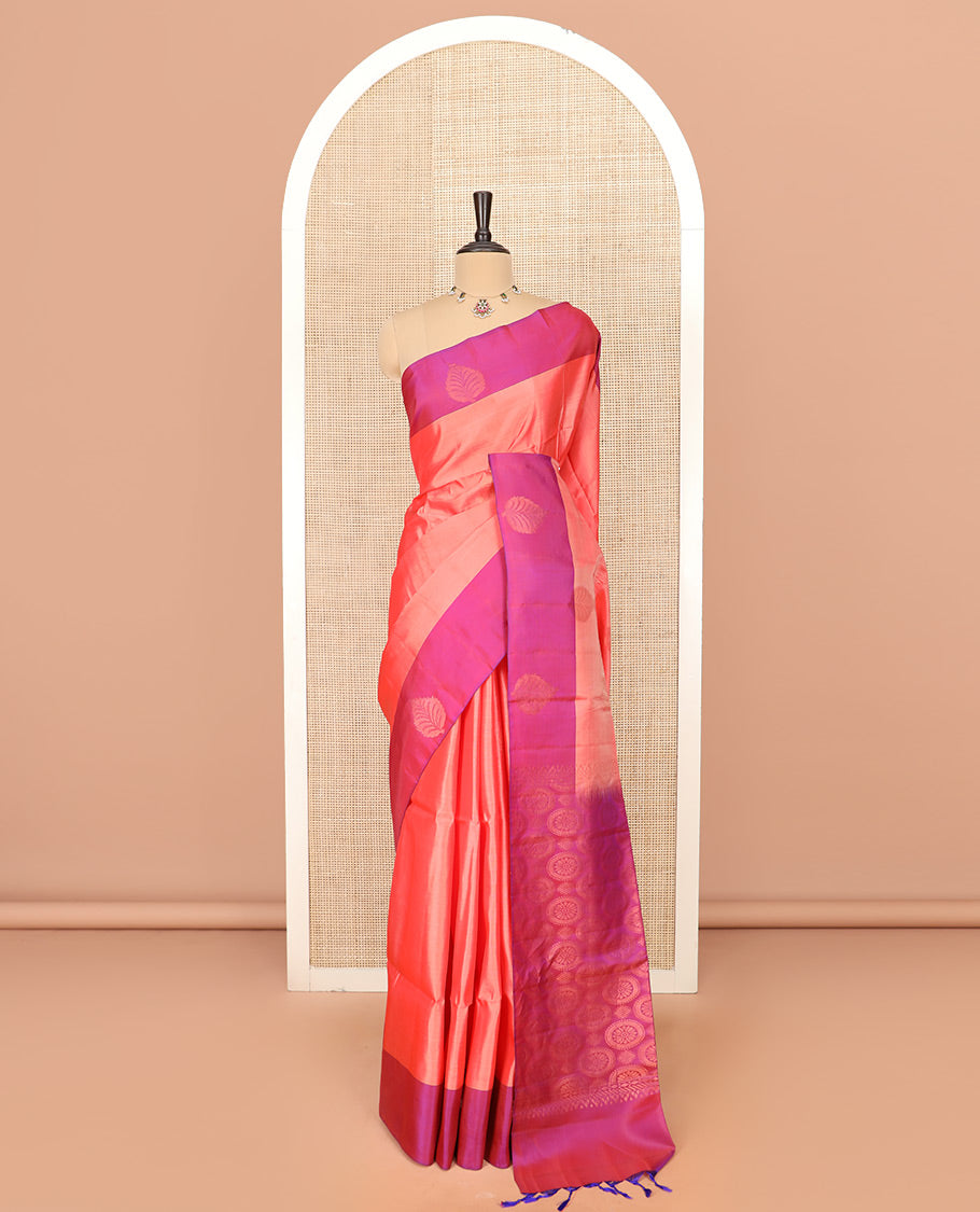 Peach Semi Uppada Saree Adorned with Zari Buttas, Complemented by a Contrasting Border of Leaf Buttas, Richly Woven Pallu Steeped with Chakram Designs, and Paired with a Contrast Blouse