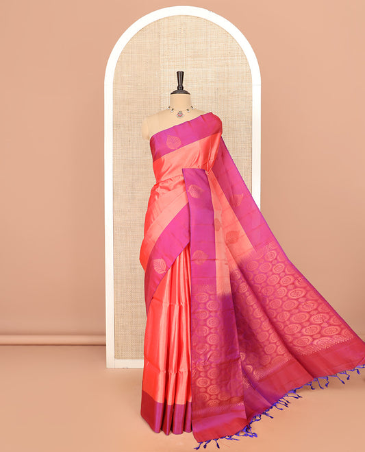 Peach Semi Uppada Saree Adorned with Zari Buttas, Complemented by a Contrasting Border of Leaf Buttas, Richly Woven Pallu Steeped with Chakram Designs, and Paired with a Contrast Blouse