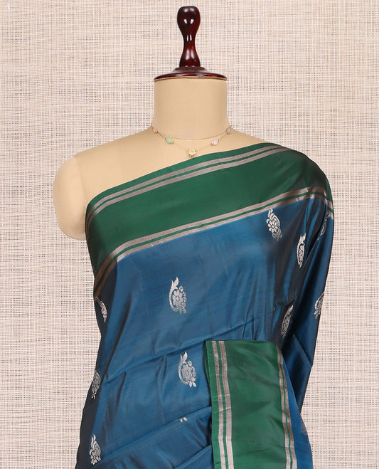 Blue Uppada Saree, Adorned with Zari Buttas, a Contrast Zari Striped Border, Grand Geometric Pallu, and a Contrast Blouse