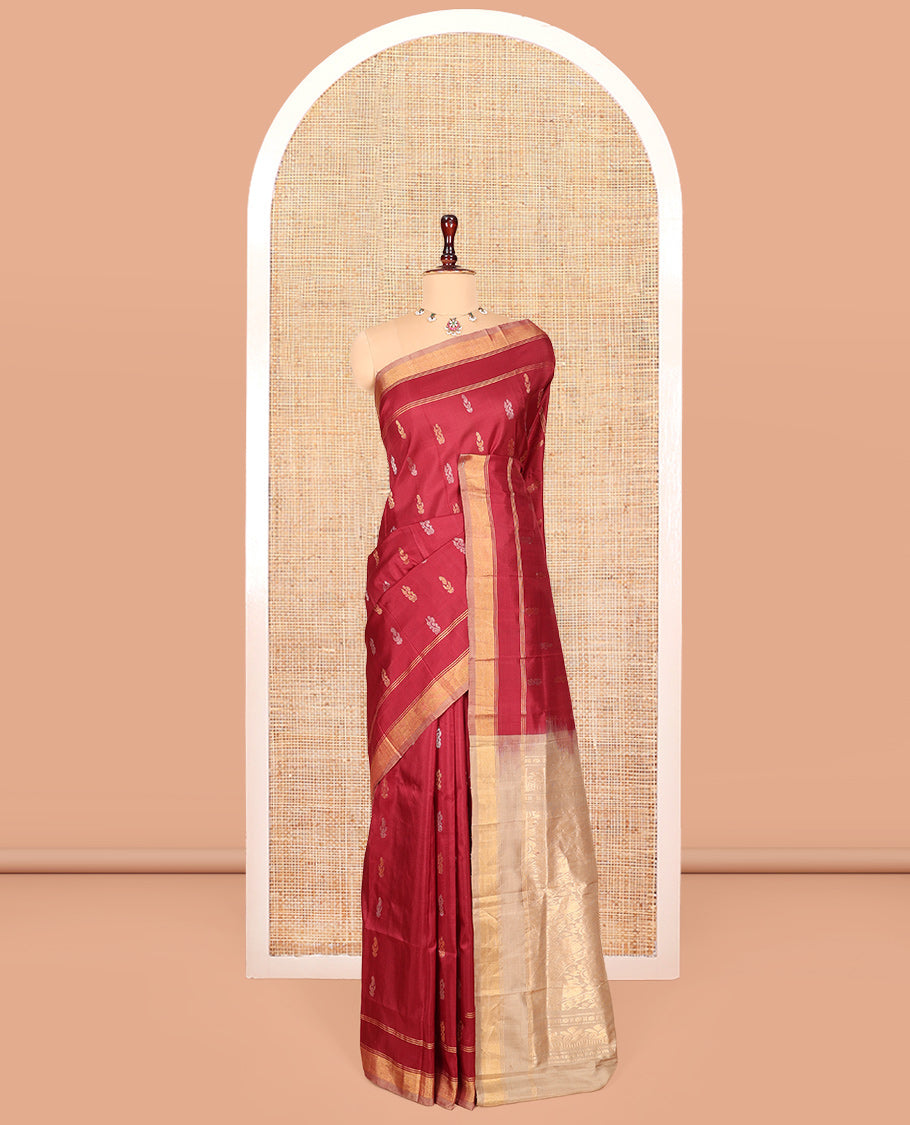 Red Uppada Silk Saree, Adorned with Buttas, a Contrast Zari Border, an Intricately Designed Pallu, and a Contrast Blouse