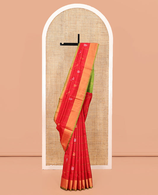 Red Uppada Silk Saree, Gleamed Up with Butta Enclosed Checks, a Contrast Zari Border, Pallu of Zari Designs, and a Contrast Blouse