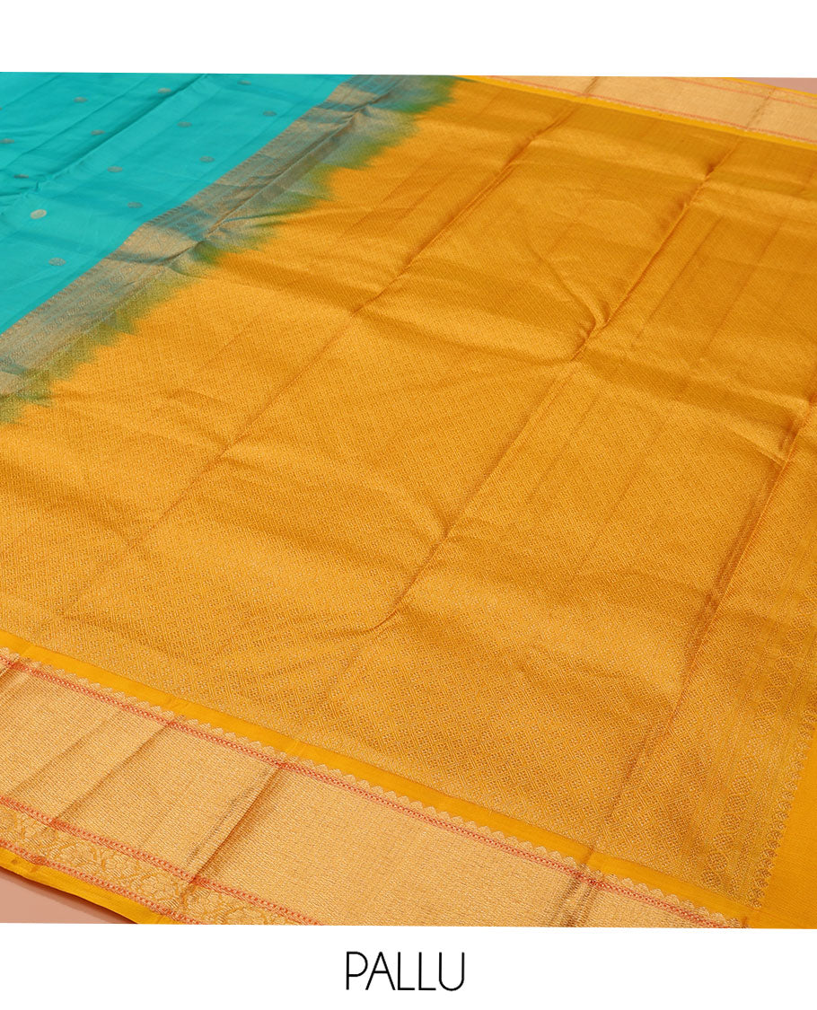 Blue Vasundhara Lite-Silk Mix Saree, Mesmerized with Zari Buttas All Over Its Body, Complemented by Contrast Border Featuring Thilakam Mokku, Muthu, Mayil Kann, and Kodi Visiry Designs, Grand Jaal Pallu, and Paired with a Contrast Blouse