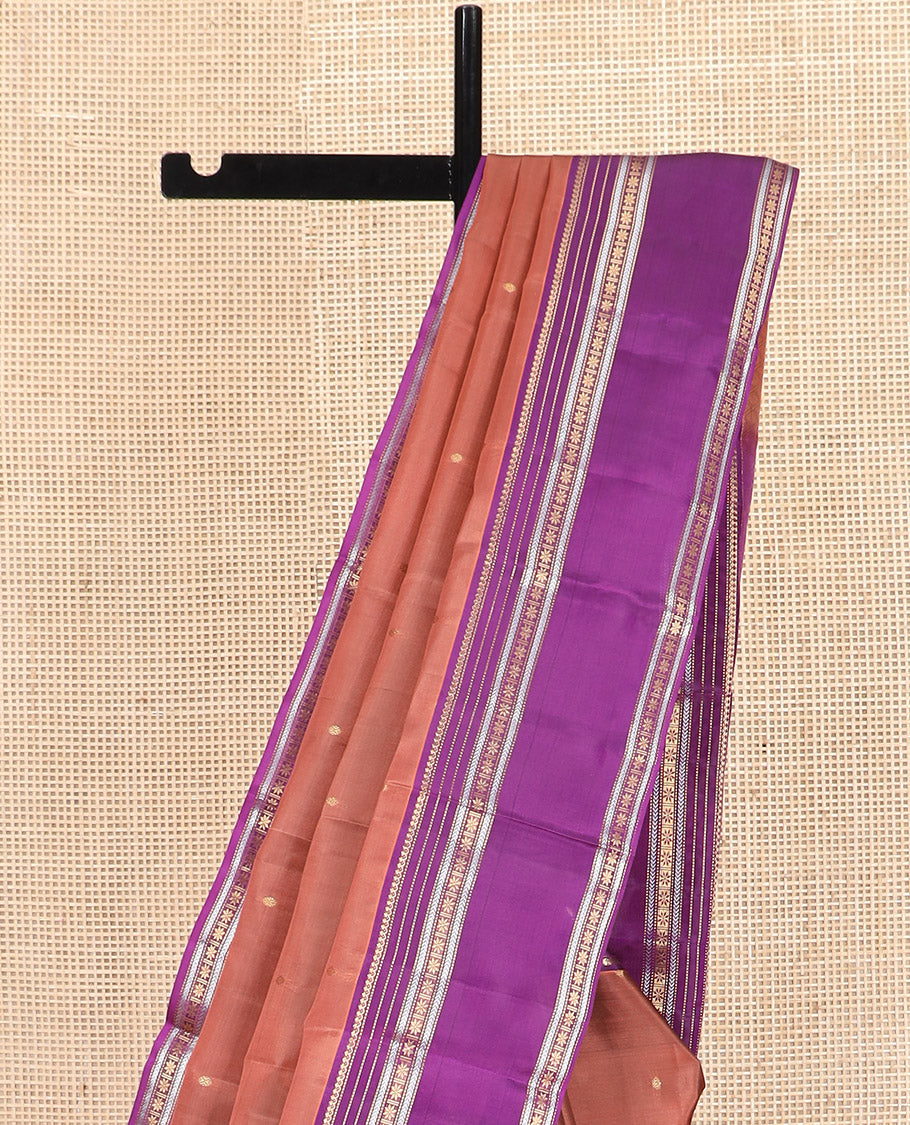 Rust Vasundhara Lite Silk Mix Saree Adorned with Rudraksham Buttas, Complemented by Contrast Varisai Pettu Border of Thilakam Mokku, Muthu, Kathir, and Star Vanki Designs, Pallu of Jaal Designs, and Paired with a Contrast Blouse