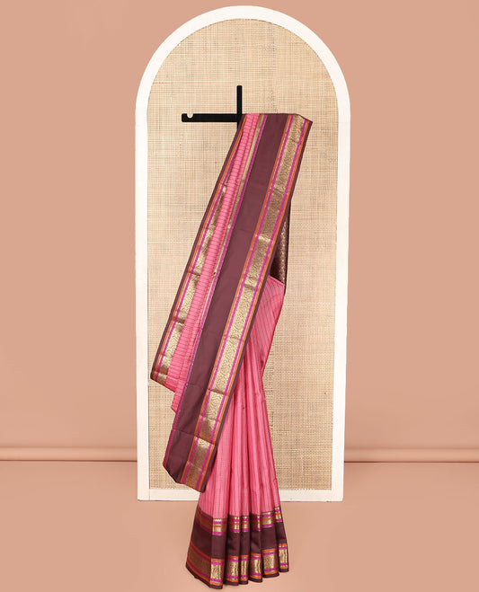 Pink Vasundhara Lite Silk Mix Saree, Decked Up with a Checked Design on Its Body, Complemented by a Contrast Rettai Pettu Border of Salngai, Poo Chakram, Muthu, Kathir, and Manga Designs, Pallu Steeped with Leaf Motifs, and Paired with a Contrast Blouse