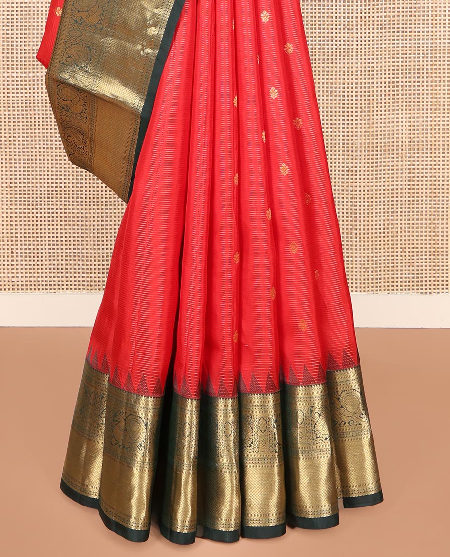 Red Vasundhara Lite Silk Mix Saree, Delicately Woven with Zari Buttas and Stripes, Complemented by a Contrast Border of Rekku, Muthu, Mayil, and Mayil Kann Designs, Pallu Steeped with Peacock Feather-Like Designs, and Paired with a Contrast Blouse