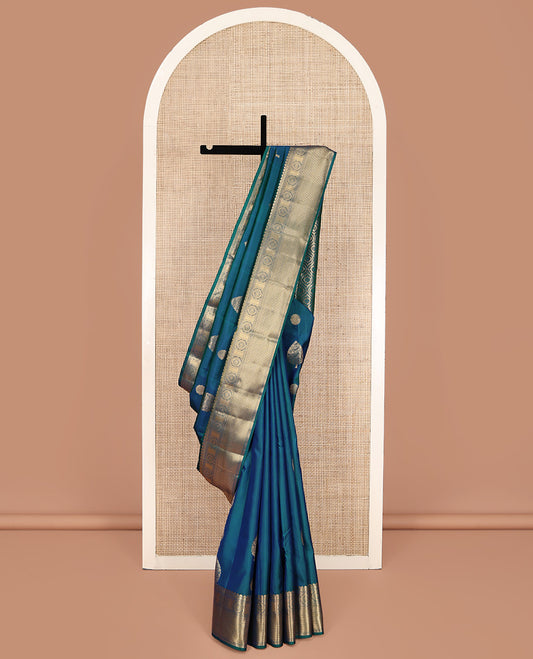 Blue Vasundhara Lite Silk Mix Saree, Elevated with Zari Buttas All Over Its Body, Highlighted by Zari Border of Chakram and Vanki Designs, Grandly Zari Woven Pallu and Paired with a Matching Blouse