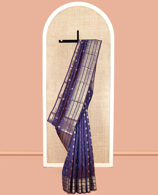 Blue Vasundhara Lite Silk Mix Saree, Adorned with Zari Buttas, Zari Border of Kathir, Muthu, and Mayil Designs, Scallop Pallu, and Matching Blouse