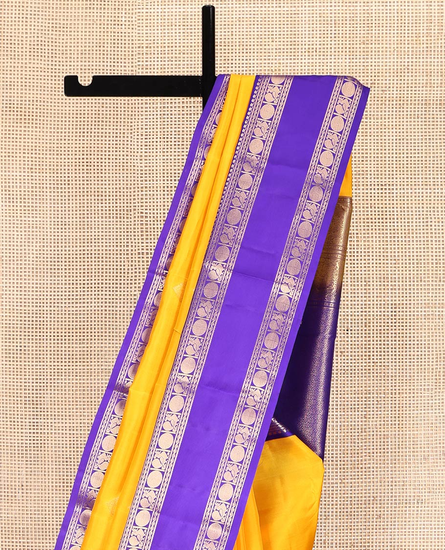 Yellow Vasundhara Lite-Silk Mix Saree, Sparsely Woven with Zari Buttas, a Contrast Rettai Pettu Border of Mayil and Rudraksham Design, Intricately Designed Pallu, and a Contrast Blouse