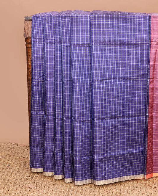 Borderless blue micro-checked banana pith saree, contrast pallu of stripes, and buttas