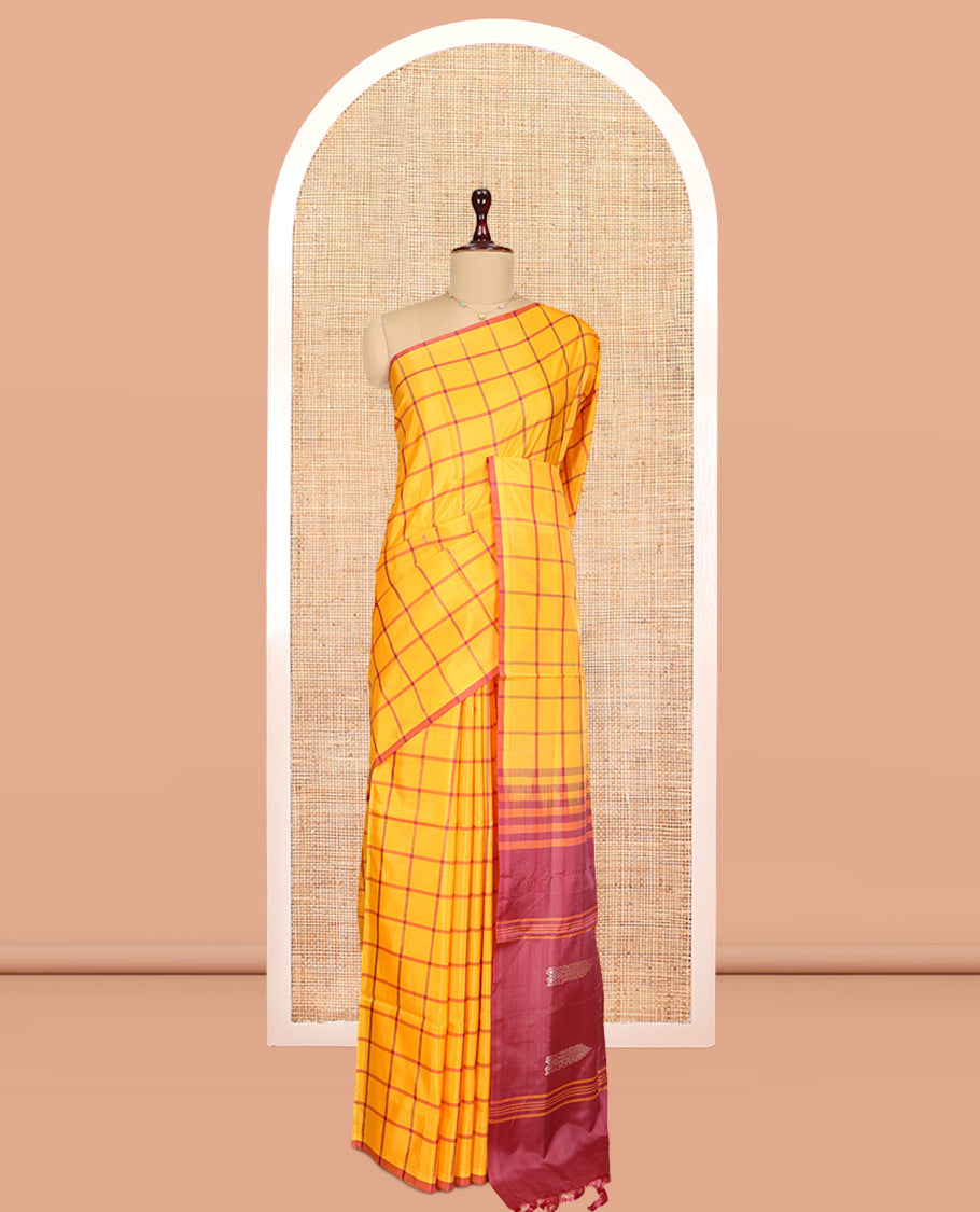 Borderless Orange Checked Banana Pith Saree, a Contrast Pallu of Buttas and Stripes, and a Contrast Blouse