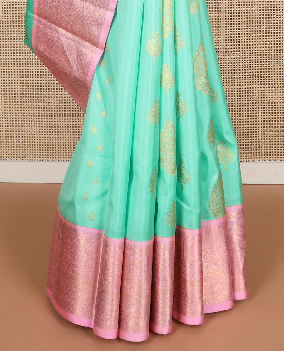 Sea blue floral buttas silk saree with contrast border of intricate zari design & floral jaal design pallu