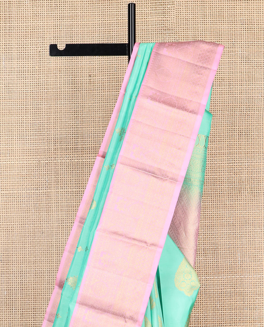 Sea blue floral buttas silk saree with contrast border of intricate zari design & floral jaal design pallu