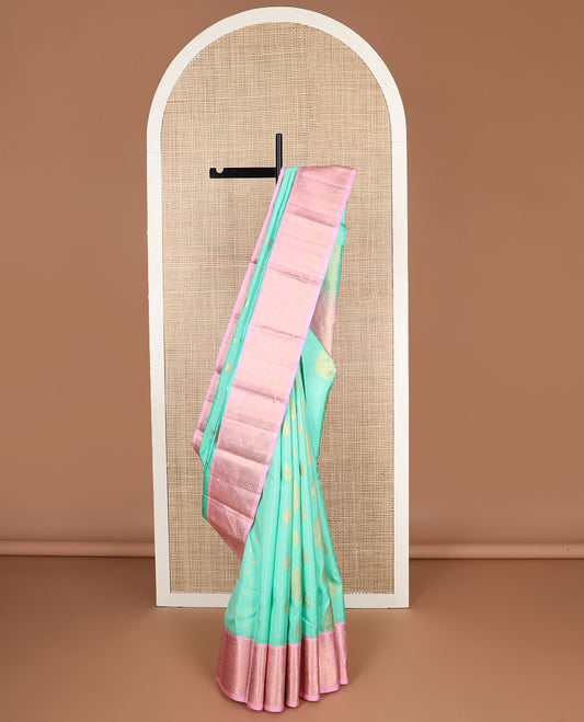 Sea blue floral buttas silk saree with contrast border of intricate zari design & floral jaal design pallu