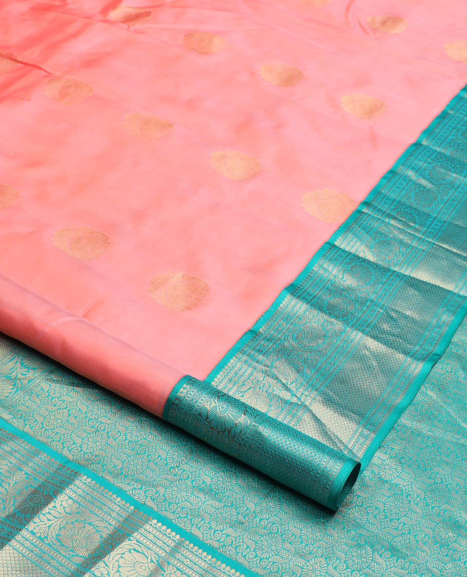 Pink zari buttas silk saree, contrast border of thilakam mokku, muthu, lavangam, kodi visiry, and kuyil kann designs, and chakram motifs steeped pallu
