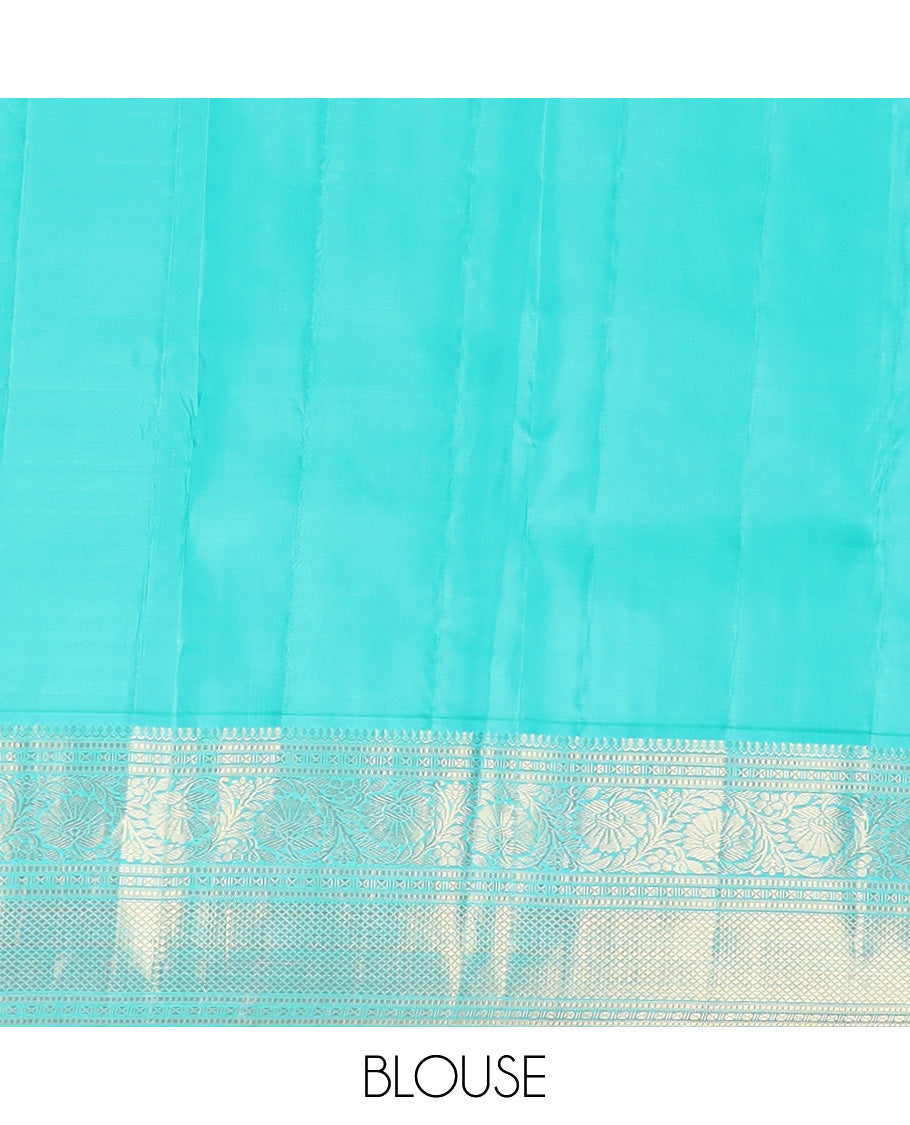 Pink zari buttas silk saree, contrast border of thilakam mokku, muthu, lavangam, kodi visiry, and kuyil kann designs, and chakram motifs steeped pallu