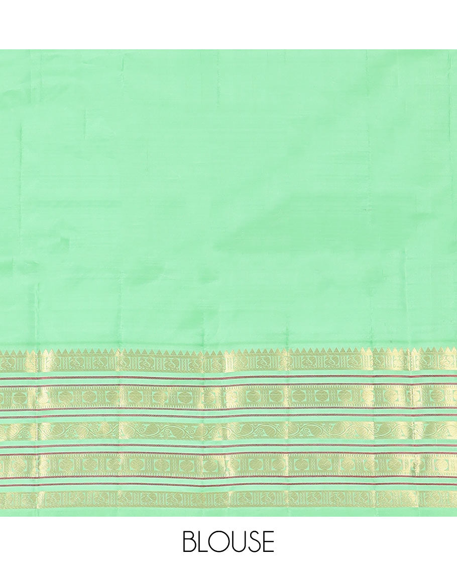 Red Vasundhara Silk Saree Subtly Woven with Zari Buttas, Complemented by a Contrast Varisai Pettu Border of Rekku, Mayil, Rudraksham, and Manga Designs, Pallu Adorned with Traditional Designs, and Paired with a Contrast Zari-Bordered Blouse