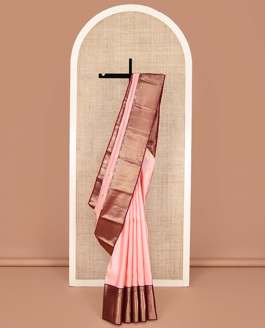 Pink Vasundhara Silk Saree, Adorned with Zari Buttas All Over Its Body, Complemented by a Contrast Border of Rekku, Iruthalai Pakshi, and Mayil Kann Designs, Grand Jaal-Patterned Pallu, and Paired with a Contrast Blouse
