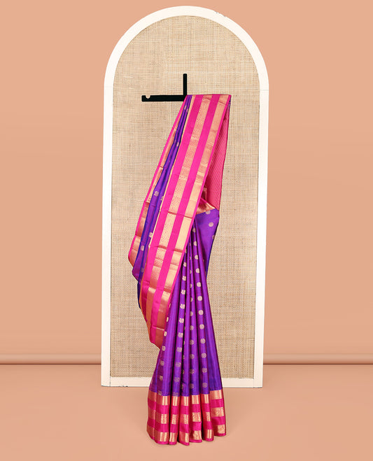 Purple Vasundhara Silk Saree, Adorned with Mayil and Chakram Buttas, Complemented by Contrast Varisai Pettu Border, Grand Jaal Pallu, and a Contrast Blouse