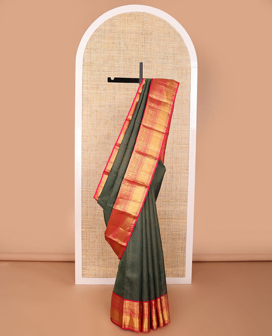 Green checked silk saree with contrast border of rekku, kathir, paun, mayil, poo chakram, mayil kann design & checked pallu