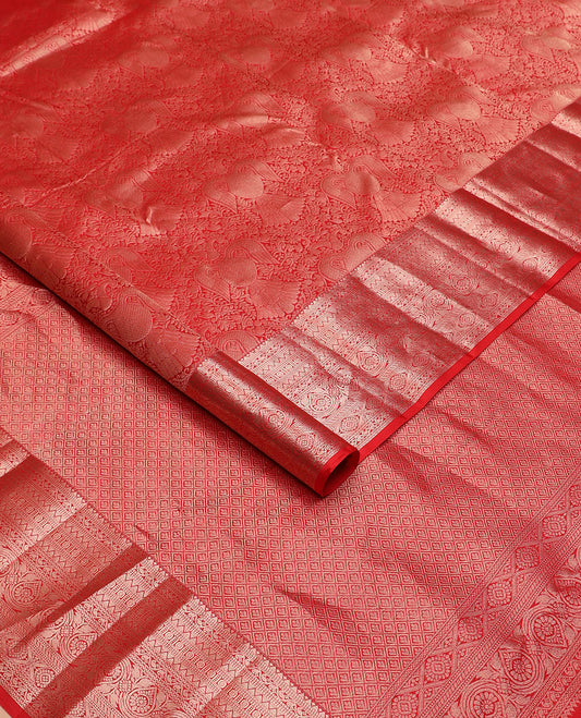 Orange iruthalai pakshi jacquard Kanchipuram wedding silk saree, zari traditional design border, and pallu of zari-rich jaal