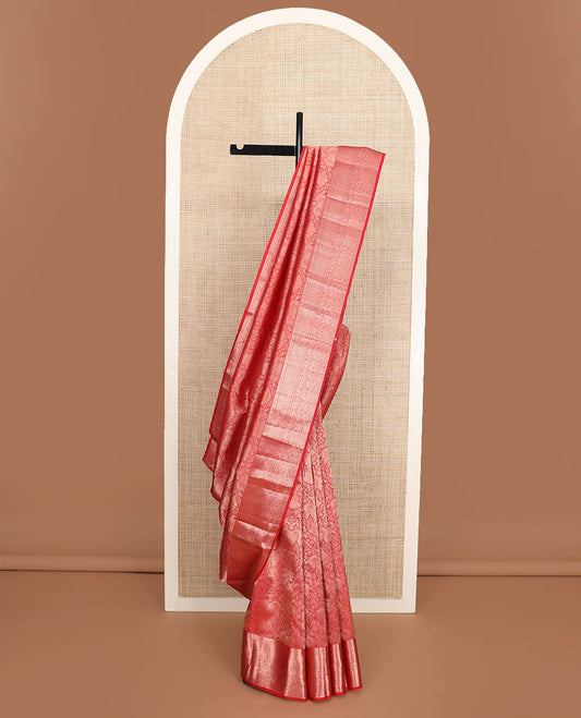 Orange iruthalai pakshi jacquard Kanchipuram wedding silk saree, zari traditional design border, and pallu of zari-rich jaal